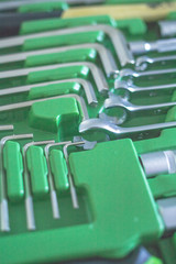 Fototapeta premium The photo of set of istrument in a green case.