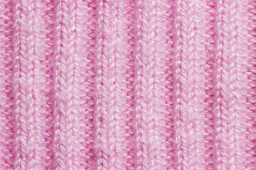 Pink knit background with patterns
