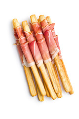 Parma ham prosciutto with grissini breadsticks.