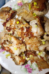 fried fish in a plate on the table