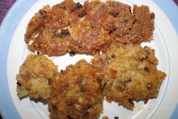 fried fish in a plate on the table