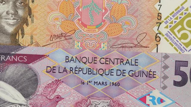 Guinea franc banknotes rotating.  Guinean currency, money. 4K stock video footage
