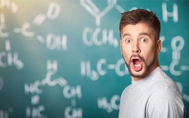 Surprised bearded man looking at camera