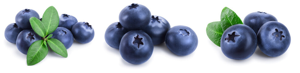fresh blueberry with leaves isolated on white background closeup. Set or collection