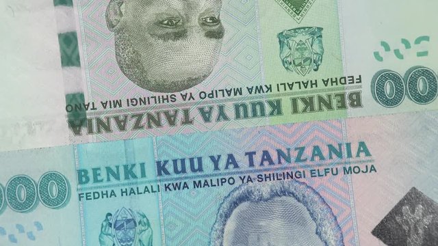 Tanzania shilling notes rotating.  Tanzanian money, currency. 4K stock video footage