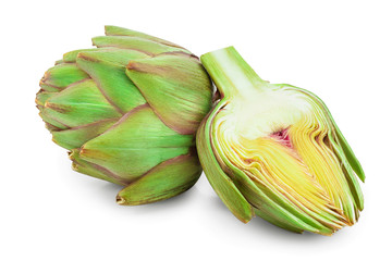 Fresh Artichokes and half isolated on white background closeup