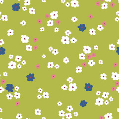 Seamless floral pattern with ditsy modern hand drawn flowers for spring and summer products, fabric, wrapping, clothing, baby and nursery, kids designs