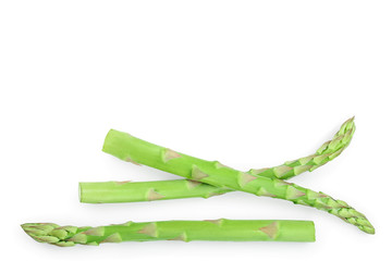 Fresh sprouts of asparagus isolated on white background with copy space for your text. Top view. Flat lay