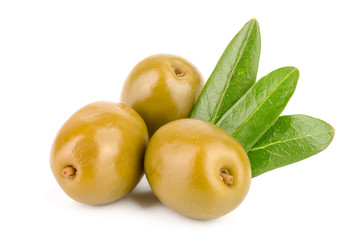 Green olives with leaves isolated on a white background