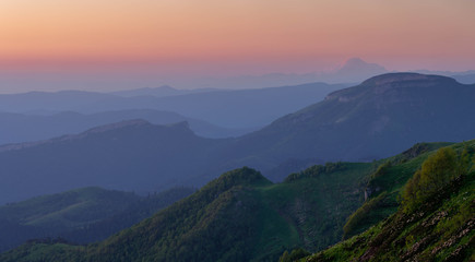 Russia. The formation and movement of clouds over the summer slopes of Adygea  the Caucasus Mountains