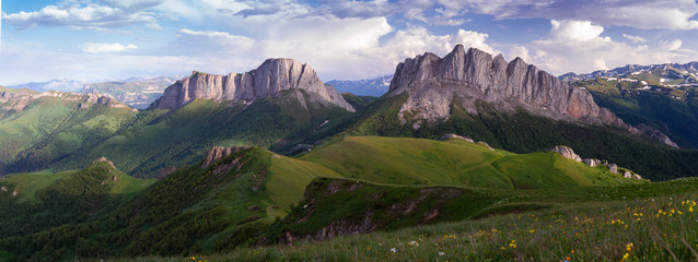 Russia. The formation and movement of clouds over the summer slopes of Adygea Bolshoy Thach and the Caucasus Mountains