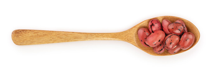 brown kidney bean in wooden spoon isolated on white background. Top view. Flat lay