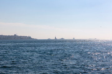 Fototapeta premium Istanbul Skyline with Maiden Tower Across the Bosphorus