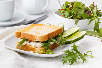 Sandwich with fresh lettuce,basil and cream cheese