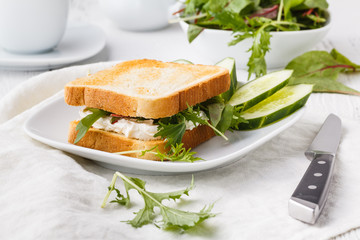 Fresh toast with cheese and herbs