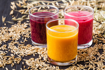 natural oatmeal milk drink with berries, vegan product