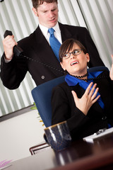 Businessman Choking Businesswoman with Phone Cord at Desk - Business Concept