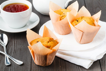 Closeup of some appetizing plain muffins for breakfast