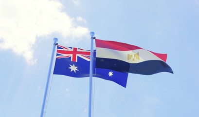 Australia and Egypt, two flags waving against blue sky. 3d image