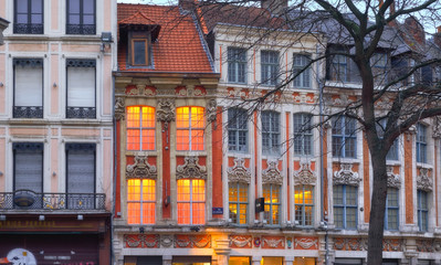 Facades of tiny colourful houses in Lille, France - 260370012