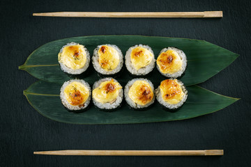 Baked rolls on slate top view