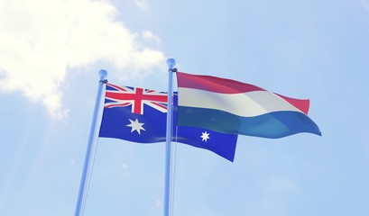 Australia and Netherlands, two flags waving against blue sky. 3d image