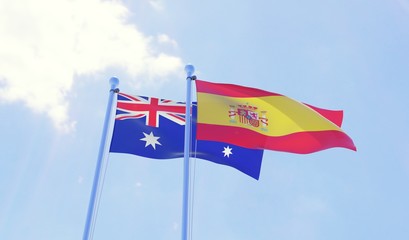 Australia and Spain, two flags waving against blue sky. 3d image