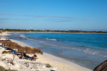 Sandy beaches of the Caribbean Sea and sunshades on Cayo Largo island, Cuba