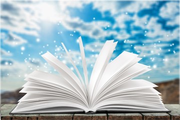 Open book isolated on background