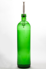 green water bottle with syringe