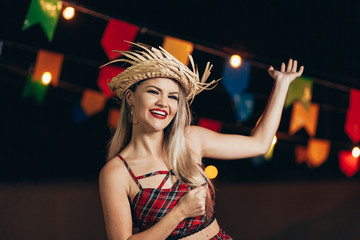 Brazilian woman wearing typical clothes for the Festa Junina - June festival