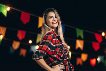 Brazilian woman wearing typical clothes for the Festa Junina - June festival