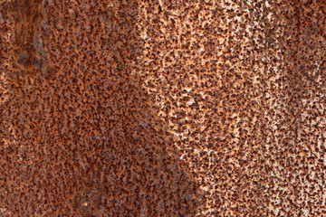 The texture of the metal. Abstract background with metal corrosion. Rusty sheet metal texture.