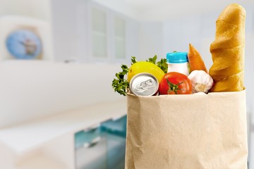 Full shopping  bag, isolated over  background