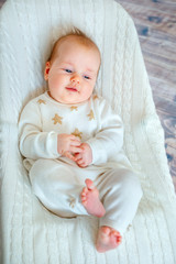 Baby girl having fun in bouncer. Activities for infants