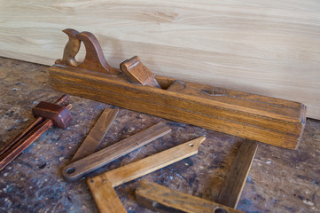 A set of old wooden carpenter tools.
