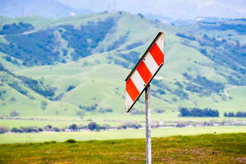 Warning Gas Pipeline marker up in the hills of south San Francisco bay area, San Jose, California