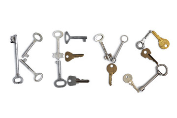 Keys word made of old keys on white isolated background. Conceptual
