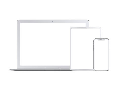Set of white devices: laptop, tablet and phone. Vector