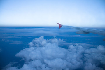 Fototapeta na wymiar Aircraft Wing on blue sky background