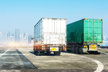White Truck on highway road with green  container, transportation concept.,import,export logistic industrial Transporting Land transport on the asphalt expressway