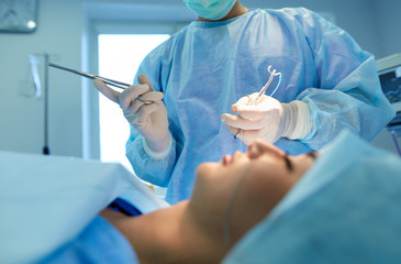 Team surgeon at work in operating room