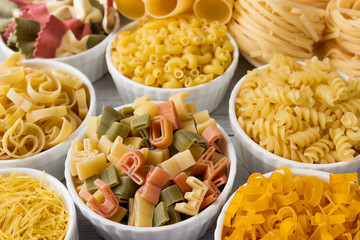 Different of types and shapes of dry Italian  of pasta.