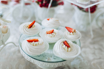 Sweet desserts on a festive buffet. Desserts for the holiday. Sweets at the restaurant.