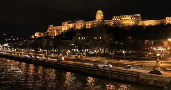 A night view of Buda castle with city traffic