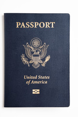 The iconic dark blue hard cover with gold stamping of an American passport set on a plain white background.