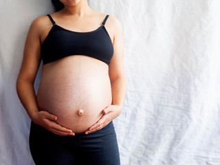 Pregnant woman. 9th Month of Pregnancy. Copy space