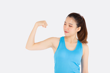 Fototapeta premium Beautiful portrait young asian woman wear sport clothes have strong and muscle with health, girl show biceps with exercise and workout for wellness isolated white background, strength and fit concept.
