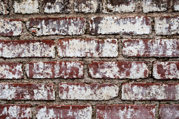 aged painted brick wall for background or texture.