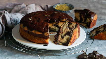 matcha green tea and chocolate cake. top view, copy space, grey background